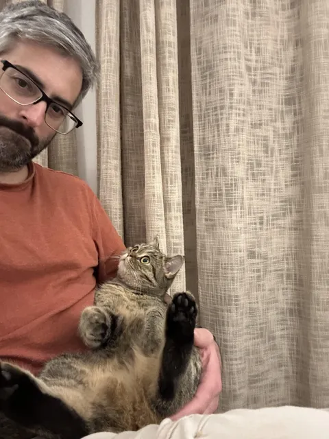 Amos Weiskopf with cat